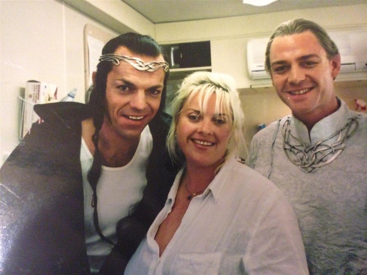 Gail Wilson with Lord of the Rings cast in elven costume and circlet